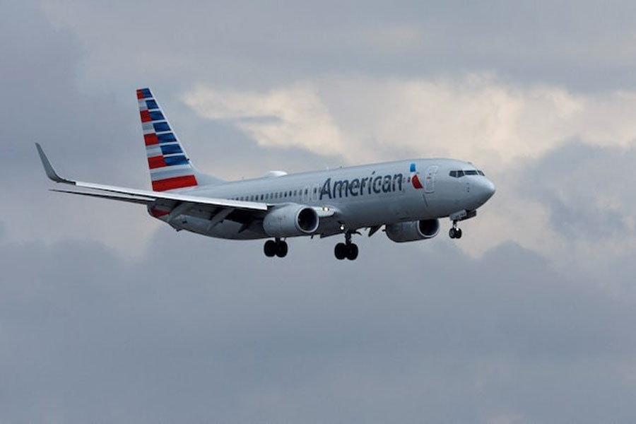 An American Airlines commercial aircraft approaches to land at John Wayne Airport in Santa Ana, California US January 18, 2022.