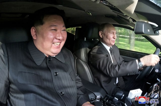 Russia's President Vladimir Putin and North Korea's leader Kim Jong Un ride an Aurus car in Pyongyang, North Korea in this image released by the Korean Central News Agency June 20, 2024. KCNA via REUTERS/File Photo
