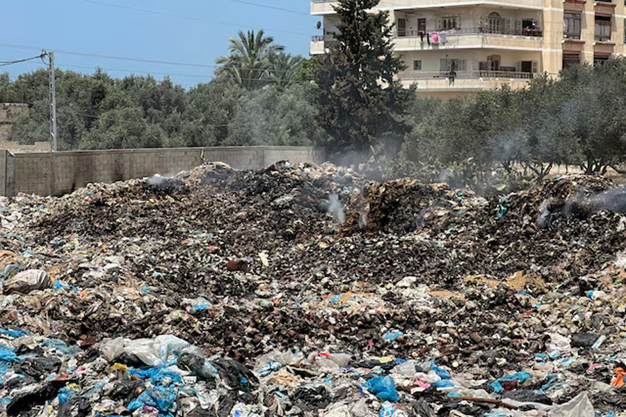 A view shows piles of garbage, amid the ongoing conflict in Gaza between Israel and Hamas, at Deir Al-Balah, in the central Gaza Strip, May 2, 2024.