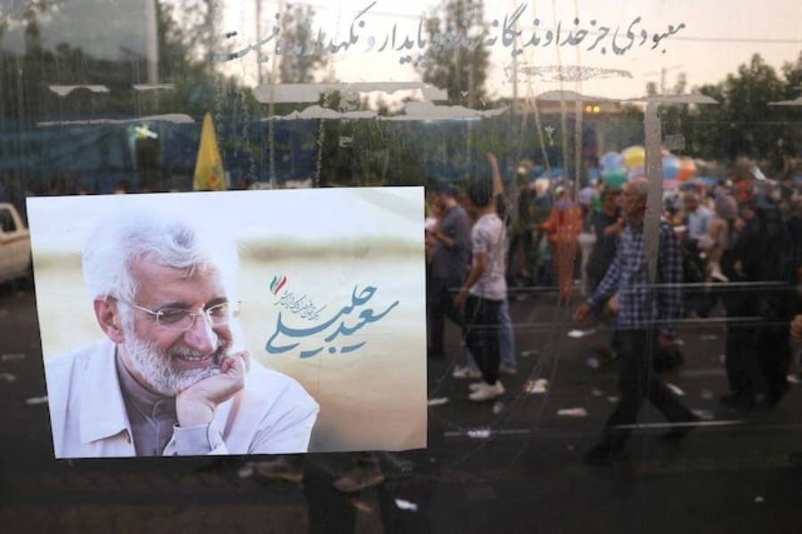 A poster of Iranian presidential candidate Saeed Jalili is seen on a street in Tehran, Iran, June 25, 2024.