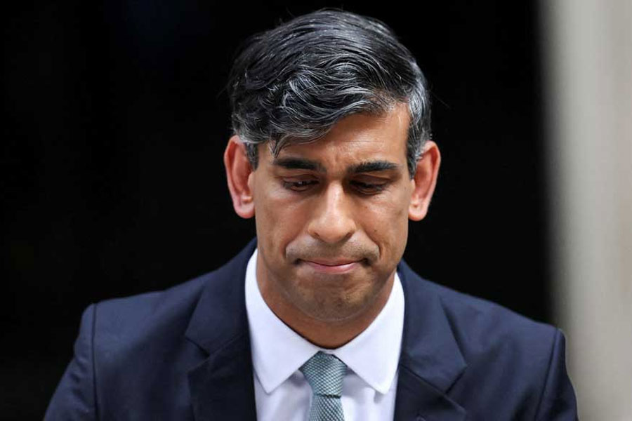 Outgoing British Prime Minister Rishi Sunak looks on as he speaks at Number 10 Downing Street, following the results of the elections, in London, Britain, July 5, 2024.