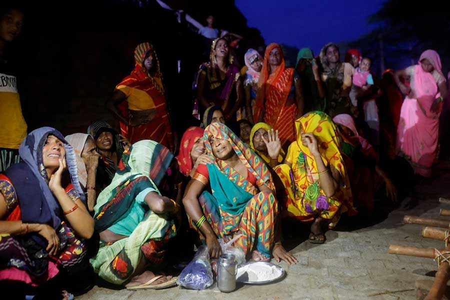 Relatives mourning the death of stampede victims Kamlesh Jatav, 22, and her seven-month-old daughter in Daunkeli village, Hathras district, in the northern state of Uttar Pradesh of India recently –Reuters photo