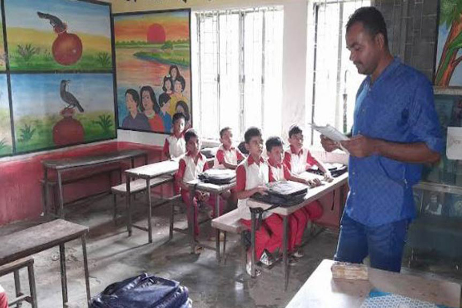 An admin staff conducting a class