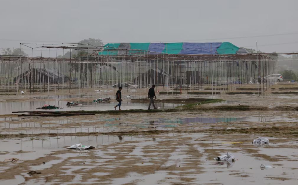 Members of the media walk at the site where believers had gathered for a Hindu religious congregation, following which a stampede occurred, in Hathras district of the northern state of Uttar Pradesh, India, July 3, 2024. REUTERS/Anushree Fadnavis/File Photo