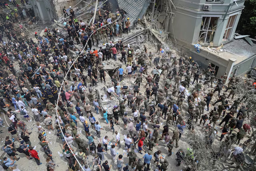 Rescuers and volunteers work at Ohmatdyt Children's Hospital that was damaged during Russian missile strikes, amid Russia's attack on Ukraine, in Kyiv, Ukraine July 8, 2024.