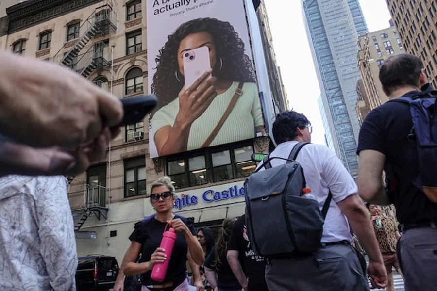 People make their way through midtown New York at the start of a work day in New York, US, on June 18, 2024.