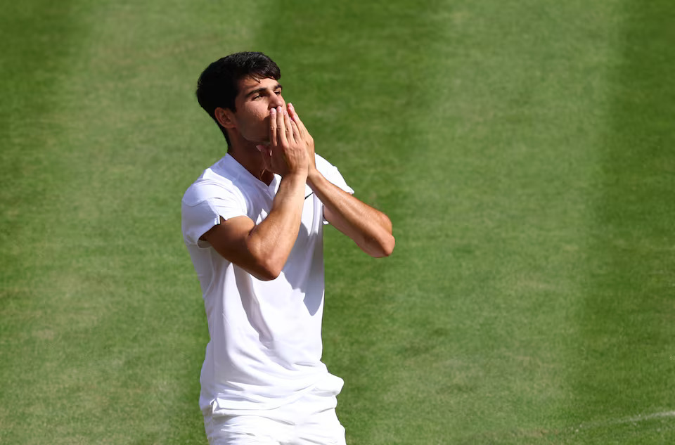 Spain's Carlos Alcaraz celebrates winning the men's singles Wimbledon final against Serbia's Novak Djokovic at All England Lawn Tennis and Croquet Club in London, Britain on July 14, 2024 — Reuters/File