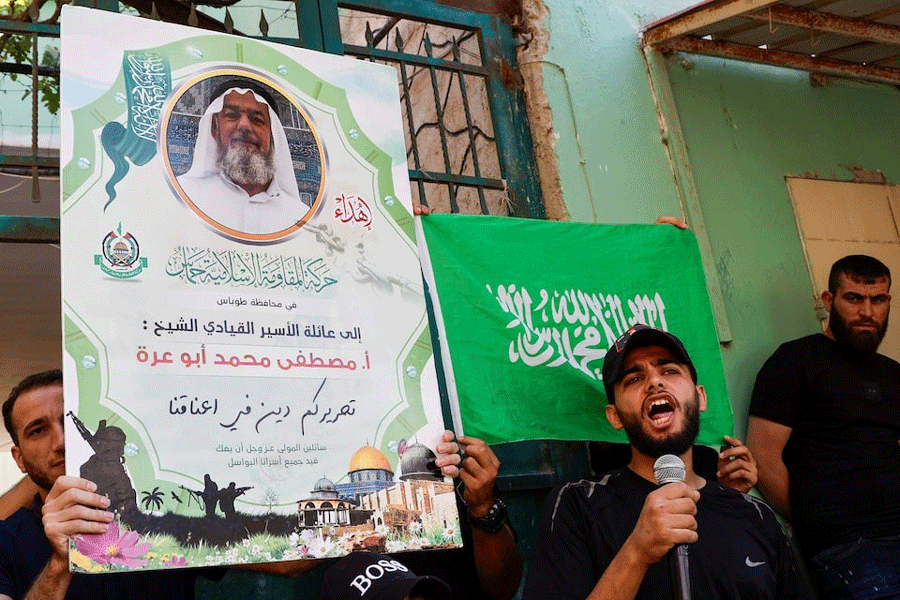 Palestinians protest the death of Mustafa Muhammad Abu Ara, a Hamas leader in the West Bank who died in Israeli custody after a deterioration in his health condition, according to a Palestinian governmental body, in Aqaba, near Tubas, in the Israeli-occupied West Bank July 26, 2024.
