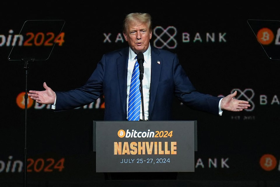 Donald Trump gestures at the Bitcoin 2024 event in Nashville