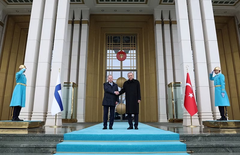Turkey's President Tayyip Erdogan and Finland’s President Sauli Niinisto shake hands during a welcoming ceremony in Ankara, Turkey March 17, 2023.