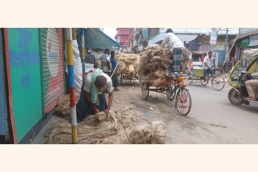 Trading in newly-harvested jute is going on at Natun Bazar in Magura town
