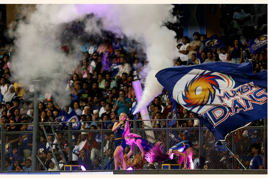 Indian Premier League- Mumbai Indians v Royal Challengers Bangalore- Wankhede Stadium, Mumbai, India - May 9, 2023. Mumbai Indians' cheerleaders celebrate during the match.