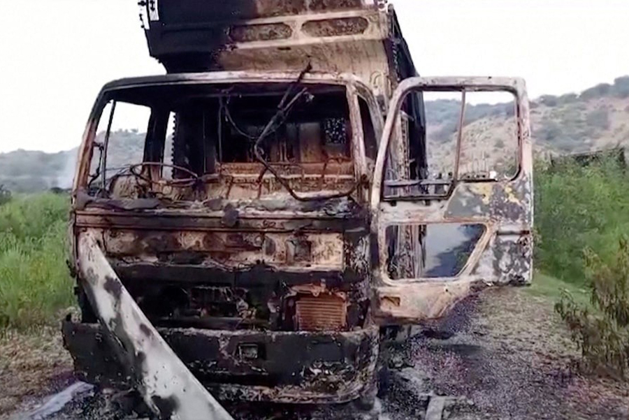 A view shows a charred vehicle, after separatist militants conducted deadly attacks, according to officials, in Balochistan province, Pakistan on August 26, 2024, in this screengrab obtained from a video. Reuters TV via REUTERS