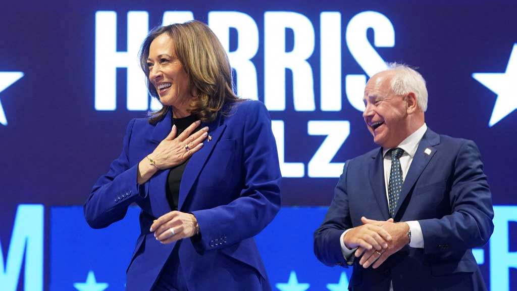 US Vice President and Democratic presidential candidate Kamala Harris and her running mate Minnesota Governor Tim Walz attend a campaign rally in Milwaukee, Wisconsin, US, August 20, 2024. REUTERS