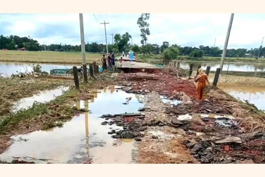 A flood-damaged road in Kamalganj upazila of Moulvibazar district