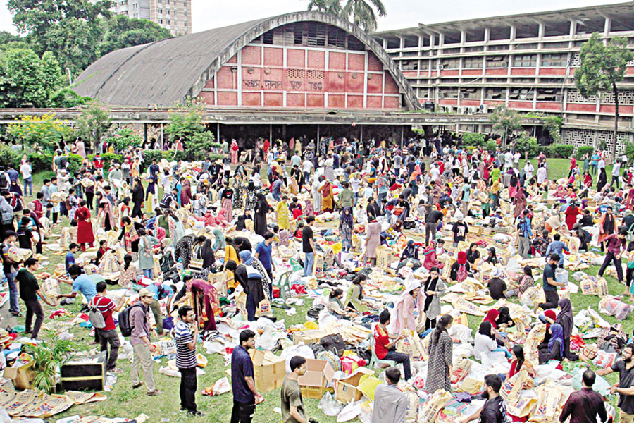 Relief supplies donated by the public are being packed on the TSC premises at Dhaka University on Saturday to aid flood-hit people in the eastern and southeastern regions of the country.