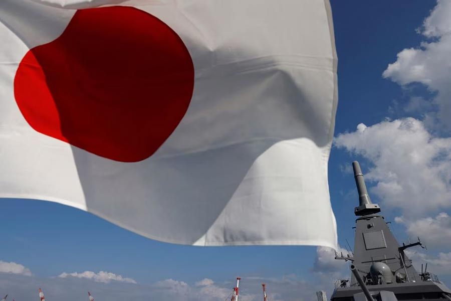 Japan’s naval ship ‘Mogami’, featuring stealth capability, is seen next to a Japan’s national flag at the Japan Maritime Self-Defense Force (JMSDF) naval base in Yokosuka of Japan on September 5 last year –Reuters file photo