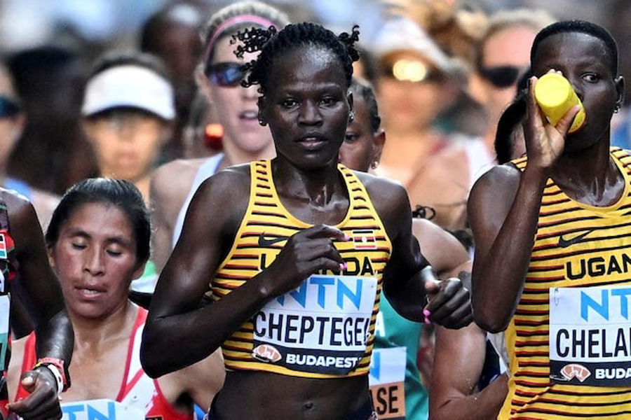 Athletics - World Athletics Championship - Women’s Marathon - National Athletics Centre, Budapest, Hungary - August 26, 2023 Uganda’s Rebecca Cheptegei in action during the women’s marathon final REUTERS/Dylan Martinez//Files