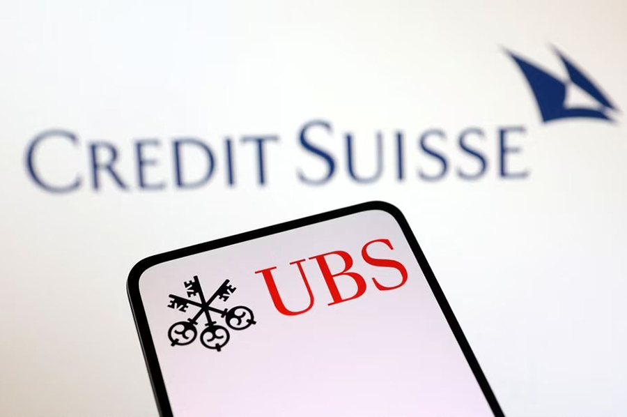 The UBS and Credit Suisse logos are seen in this Reuters illustration taken on March 18, 2023