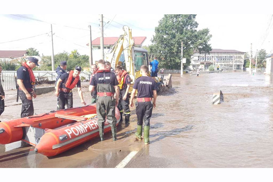 Firefighters operate in an area, after heavy rain triggered flooding in Pechea, Galati country, Romania September 14, 2024.