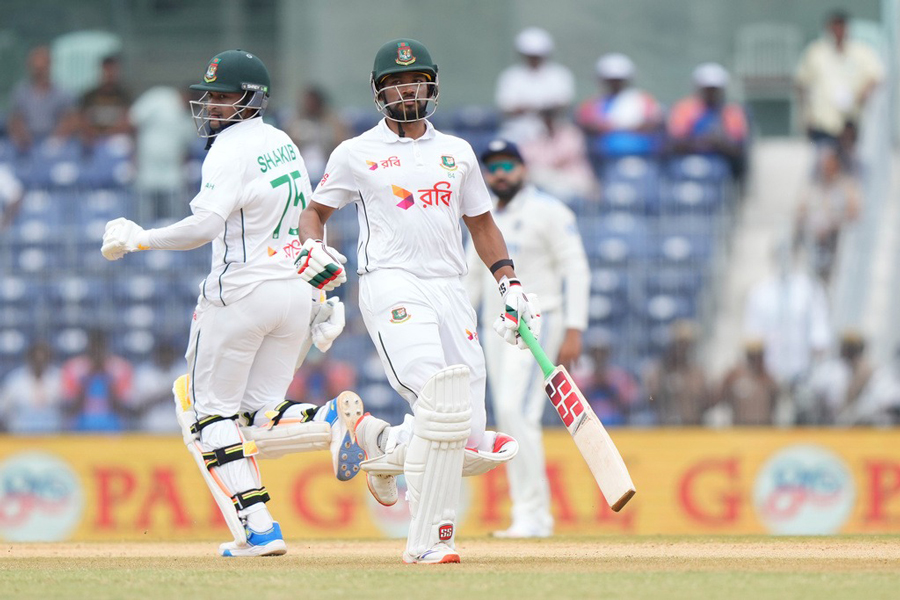 Bangladesh’s captain Najmul Hossain Shanto, right, and Shakib Al Hasan run between the wickets on the fourth day of the first cricket test match between India and Bangladesh, in Chennai, India, Sunday, Sept. 22, 2024.