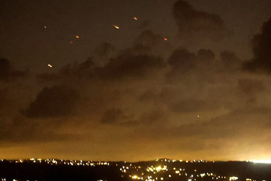 Projectiles fly in the sky after Iran fired a salvo of ballistic missiles at Israel, as seen from Tyre, southern Lebanon, October 1.