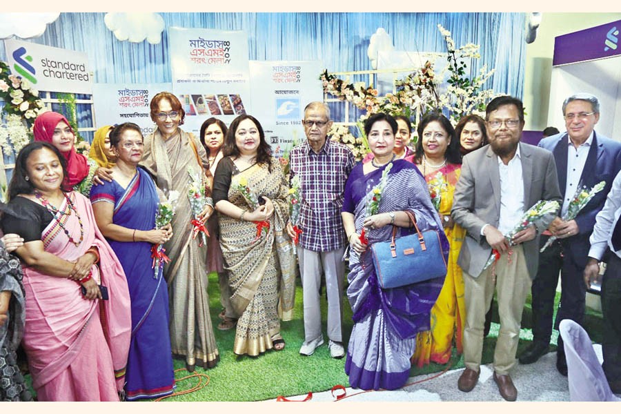 (From right to left): Ali Sabet, Khairul Bashar, Parveen Mahmud, Abudul Karim, Bitopi Das Chowdhury, Bibi Russell, Sabina Alam, Director, MIDAS Board, at the opening ceremony of "MIDAS Autumn SME Fair-2024"