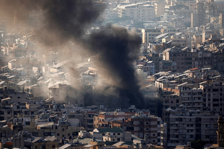 Thick smoke rises over Beirut’s southern suburbs from a generator that caught fire, according to residents, as seen from Baabda, Beirut, Lebanon, October 12, 2024.