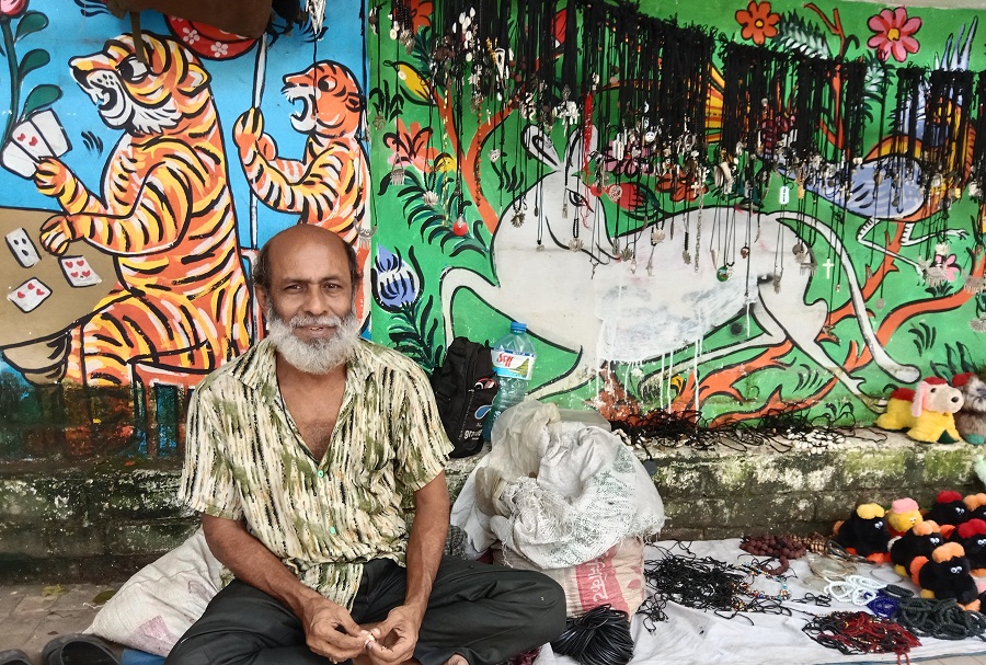 Sentu selling bead garlands at DU