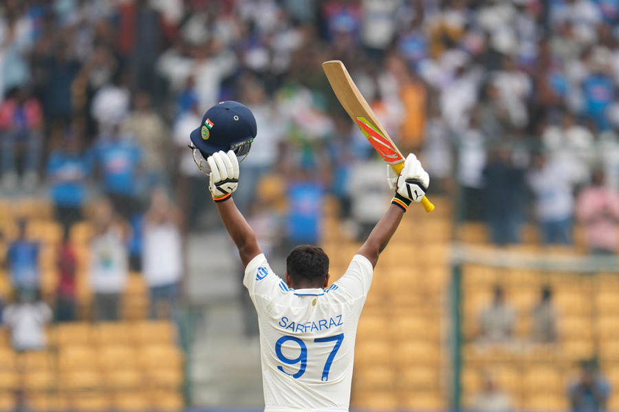 India's Sarfaraz Khan celebrates after scoring a century during the day four of the first cricket test match between India and New Zealand at the M.Chinnaswamy Stadium, in Bengaluru, India, Saturday, Oct 19, 2024.