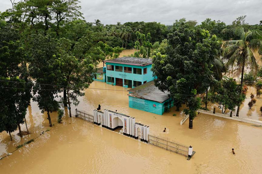 A view shows a partially submerged school and madrasa premises amid severe flooding in the Fazilpur area of Feni, Bangladesh, Aug 26, 2024.