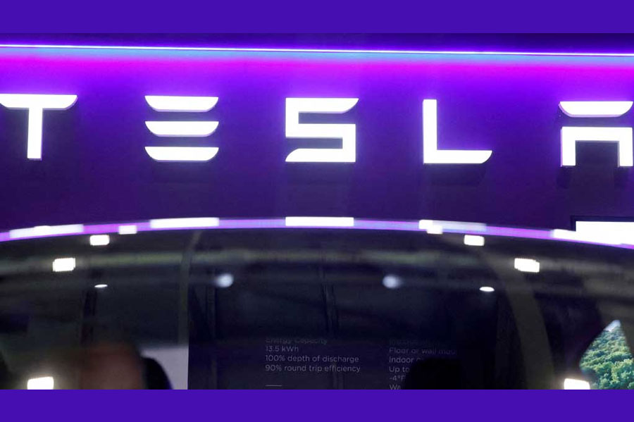 The logo of Tesla on display at the Everything Electric exhibition at the ExCeL London international exhibition and convention centre in London, Britain, Mar 28, 2024.