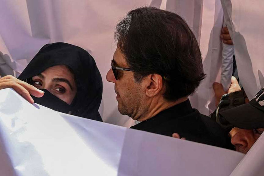 Former prime minister Imran Khan with his wife Bushra Bibi.