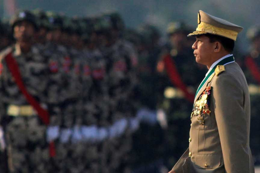 Myanmar's army chief General Min Aung Hlaing inspects troops during a parade to mark the 67th anniversary of Armed Forces Day in Myanmar's capital Naypyitaw Mar 27, 2012.