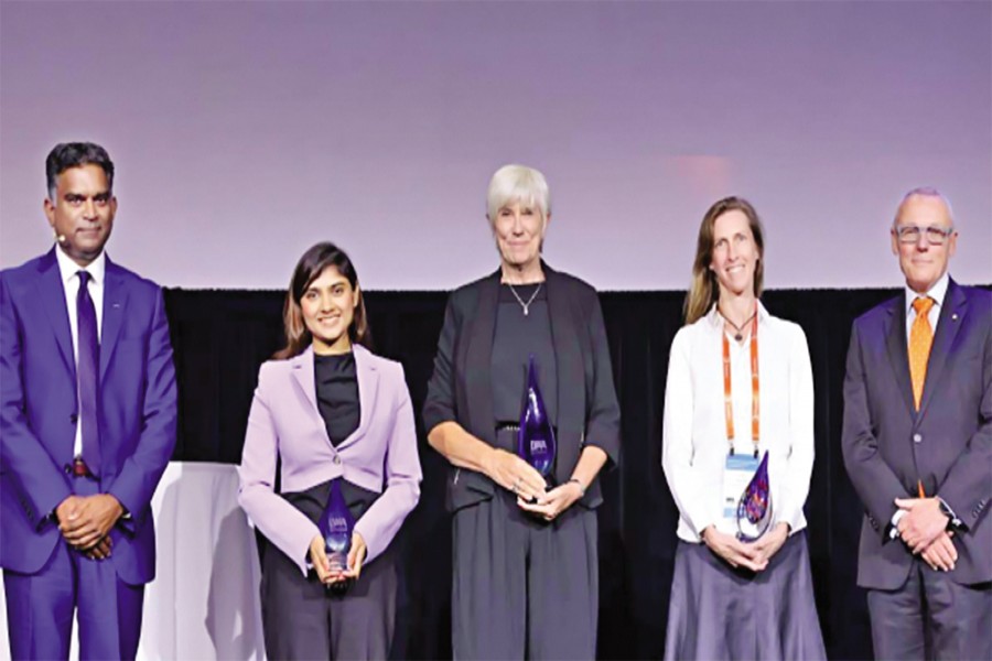 Sabrina Rashid Sheonty (second from left) is seen with International Water Association dignitaries and other awardees in Toronto, Canada