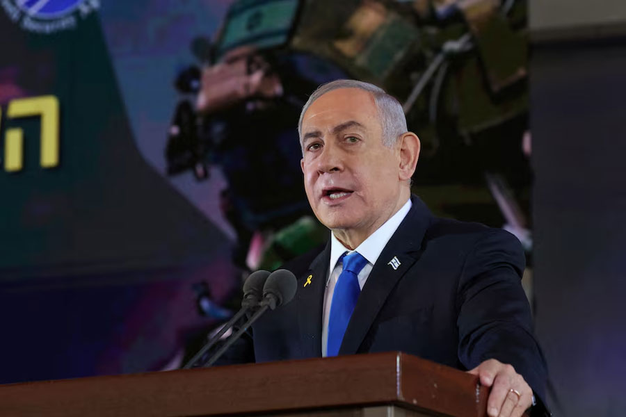 Israel's Prime Minister Benjamin Netanyahu delivers a speech during a memorial ceremony of the Hamas attack on October 7 last year that sparked the ongoing war in Gaza, at the Mount Herzl military cemetery in Jerusalem on October 27, 2024.