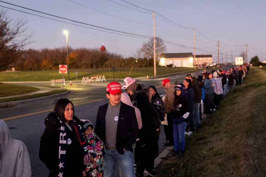 Supporters of Republican presidential nominee and former US President Donald Trump waiting in a queue outside Flyadvanced Lancaster, to attend a campaign rally, in Pennsylvania on Sunday –Reuters photo