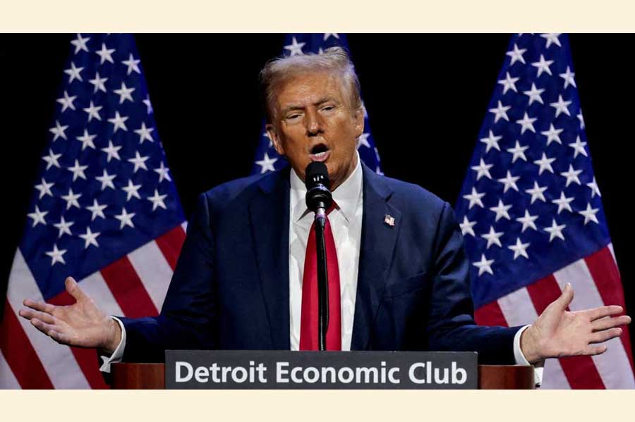 Republican presidential nominee and former US President Donald Trump addresses the Detroit Economic Club in Detroit, Michigan, US, Oct 10, 2024.