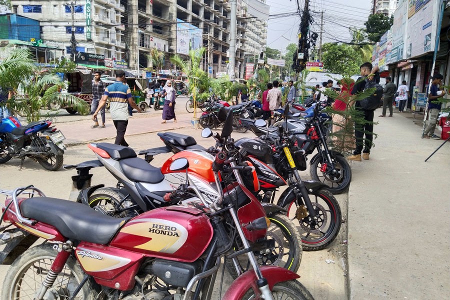 Photo shows rental bikes waiting to pick passengers at Kolatoli Beach Point in Cox's Bazar tourist town
