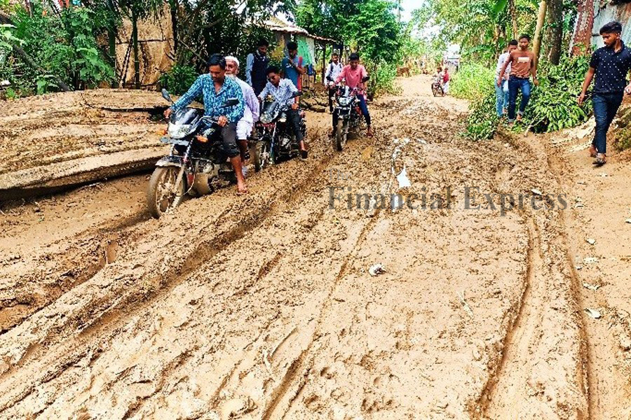Photo shows the sorry state of the Tahirpur-Badaghat road which was washed away by the devastating floods in Sylhet in 2022.— FE Photo