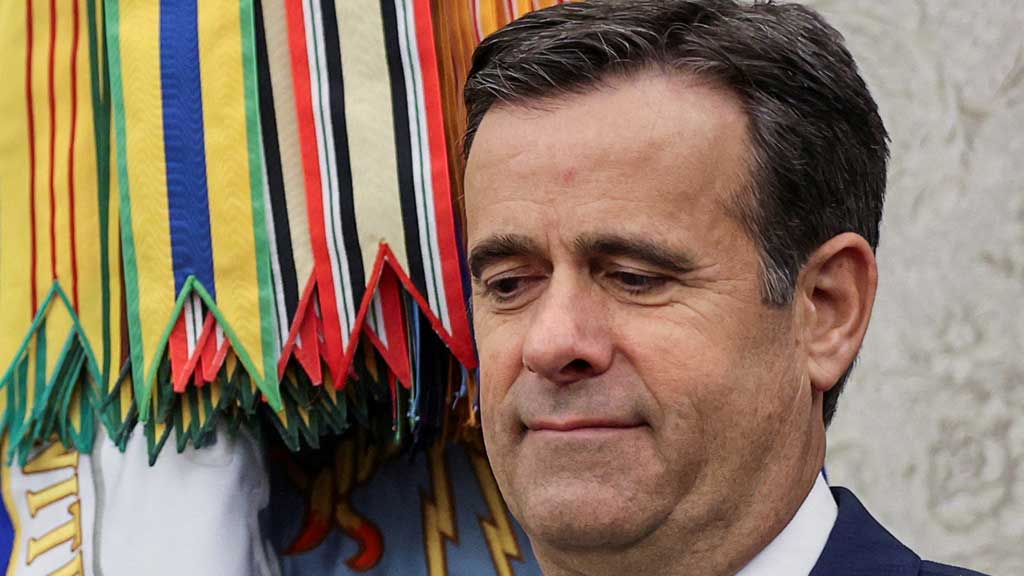 Director of Natiional Intelligence (DNI) John Ratcliffe in the Oval Office at the White House in Washington, US, December 3, 2020. REUTERS