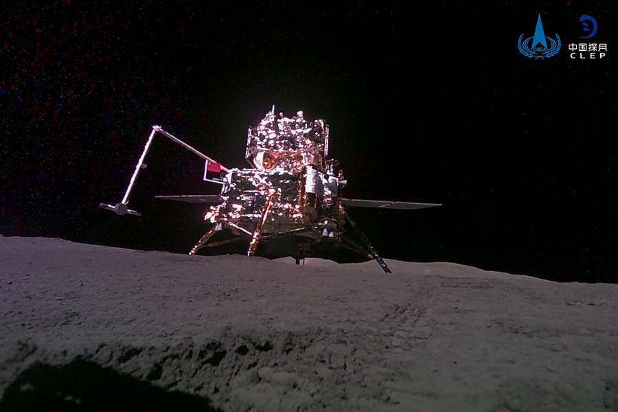 This China National Space Administration (CNSA) handout image released by Xinhua News Agency, shows the lander-ascender combination of Chang'e-6 probe taken by a mini rover after it landed on the moon surface, June 4, 2024.