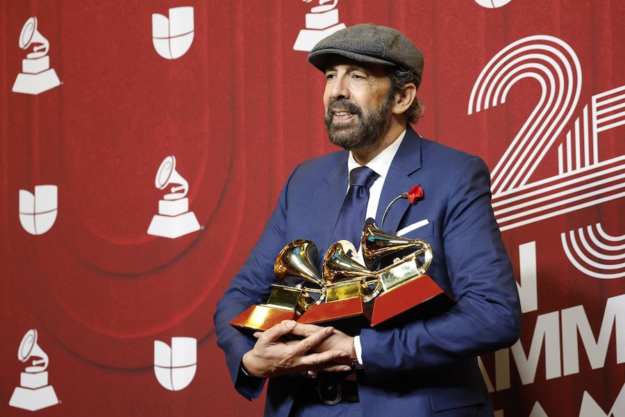 Juan Luis Guerra poses with Best Tropical Song and Record Of The Year for “Mambo 23”, and Best merenguebachata album for Radio Guira at the 25th Annual Latin Grammy Awards in Miami, Florida, US, November 14, 2024.