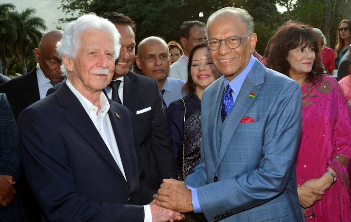 The New prime minister of Mauritius, Navin Ramgoolam, poses for a photograph with former Prime Minister and leader of the Mouvement Militant Mauricien (MMM) Paul Berenger after his swearing-in ceremony in Reduit, Mauritius November 13, 2024.