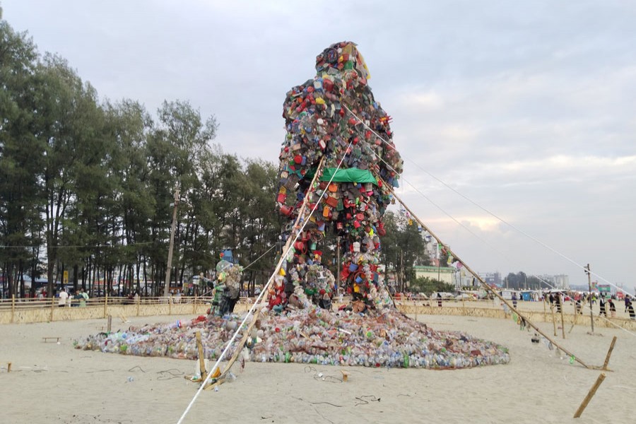 Photo shows a plastic monster statue built on Cox's Bazar sea beach