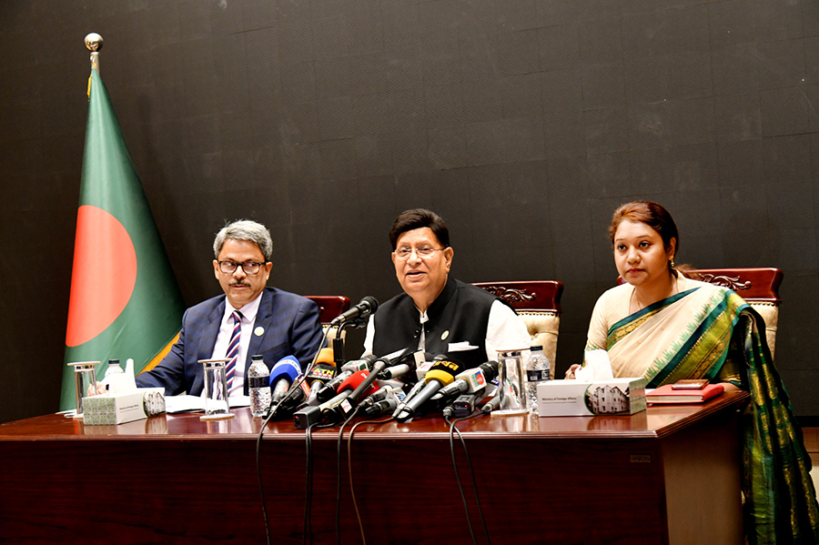 State Minister for foreign affairs M Shahriar Alam (left) reads out the IPO at a briefing in the foreign ministry in presence of Foreign Minister Dr AK Abdul Momen (centre)