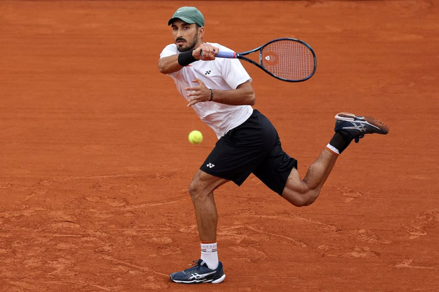 Paris 2024 Olympics - Tennis - Men’s Singles First Round - Roland-Garros Stadium, Paris, France - July 27, 2024. Hady Habib of Lebanon in action during his first round match against Carlos Alcaraz of Spain.
