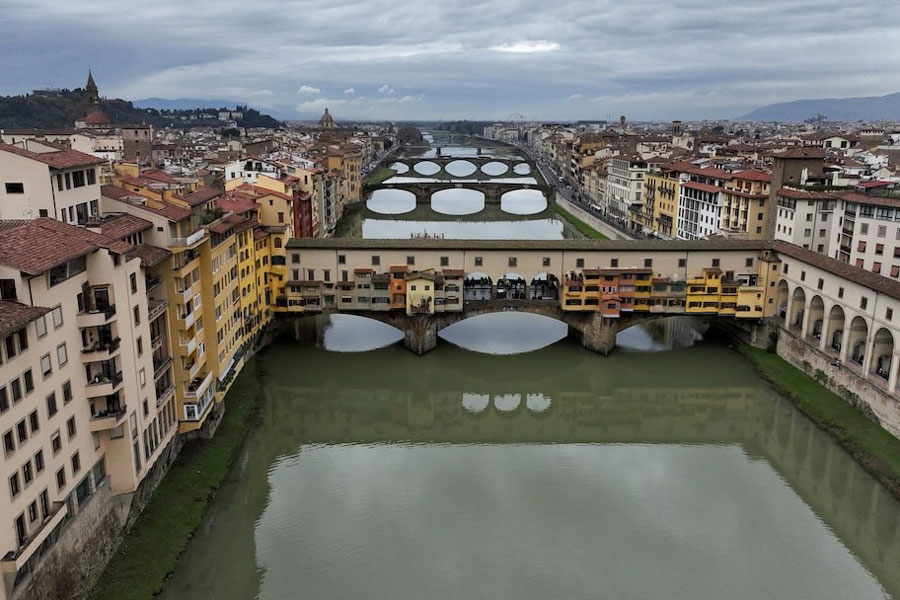 A drone picture shows Ponte Vecchio (Old Bridge) on Arno river and the Vasari Corridor, a Renaissance-era passageway built by Giorgio Vasari, in Florence, Italy.