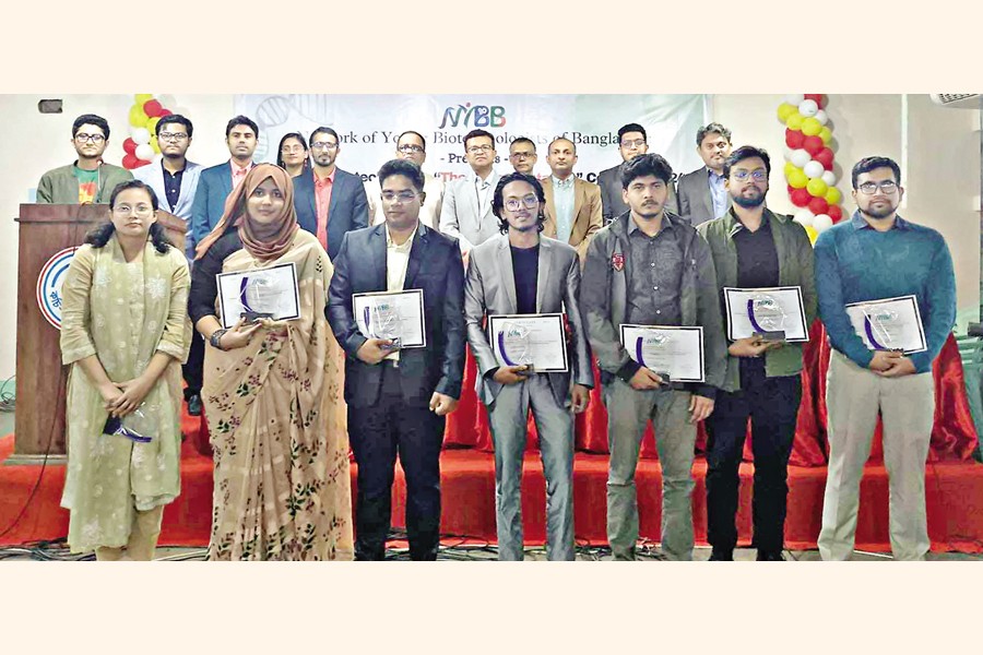 Winners and finalists with judges and guests of the event ‘National Biotechnology Thesis Contest’ held in Dhaka on Friday