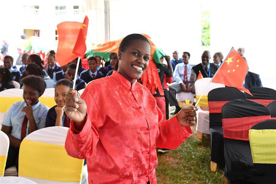 A teacher in Chinese costume from Rusinga School attends the unveiling ceremony of the Confucius Classroom at Rusinga School in Nairobi, Kenya, May 10, 2017 —Xinhua Photo
